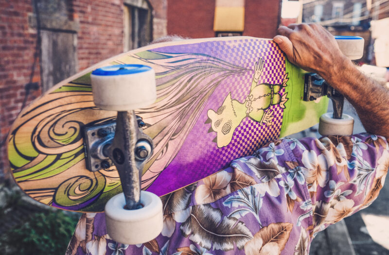 Man Holding Skateboard Free Stock Photo