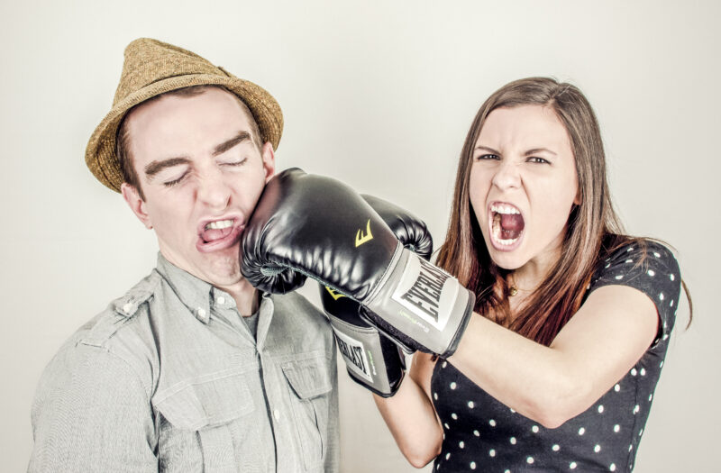 Woman Punching a Man Free Stock Photo